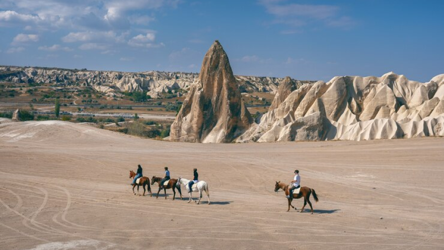 tourists-enjoy-ride-horses-cappadocia-turkey_335224-556 2 (1)